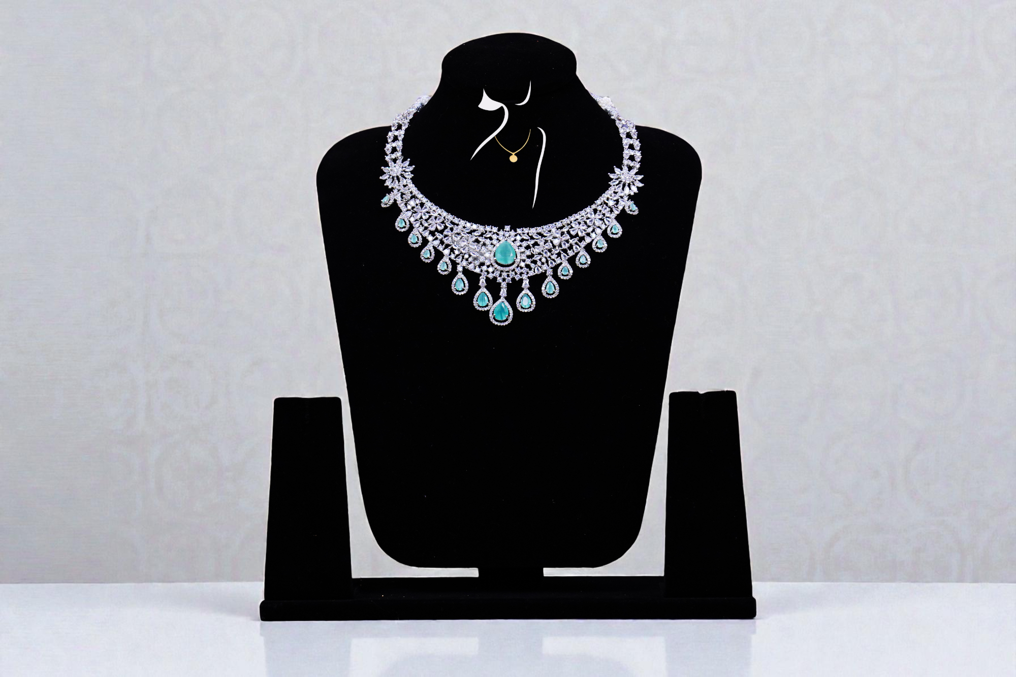 Platinum Water Drops with Emerald Stones